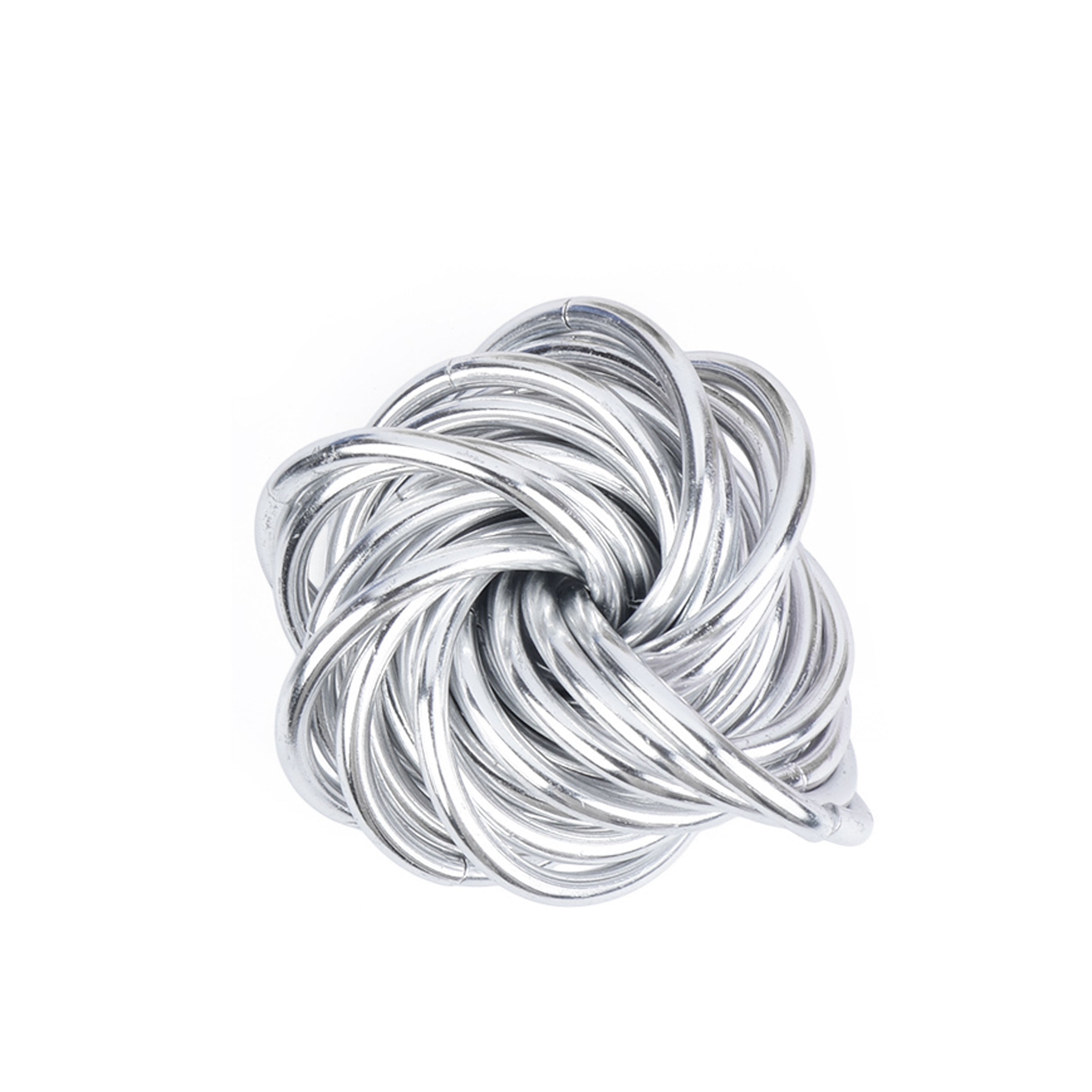 Silver knot-shaped hair tie on a white background