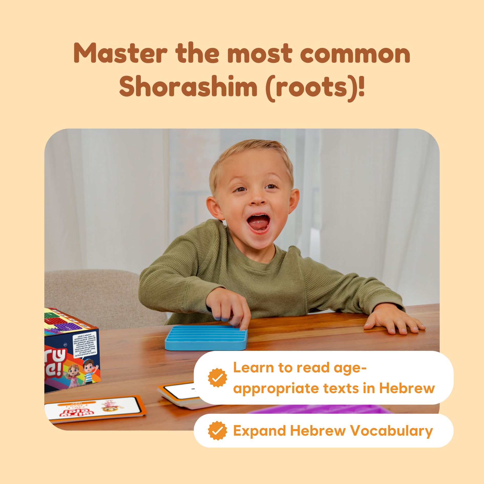Child playing with educational cards on a table, with text about learning Hebrew vocabulary.