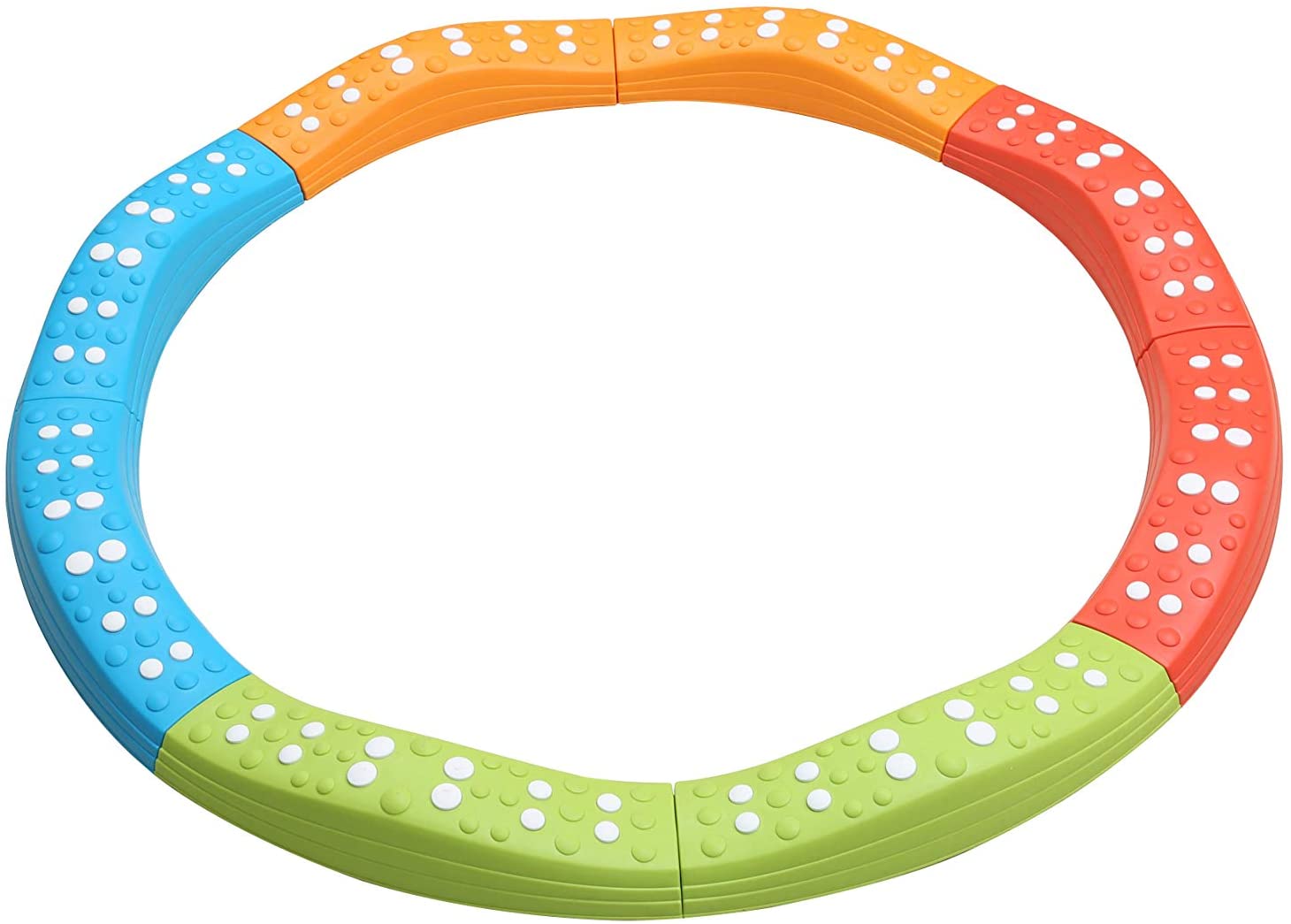Colorful plastic ring toy with white dots on a white background