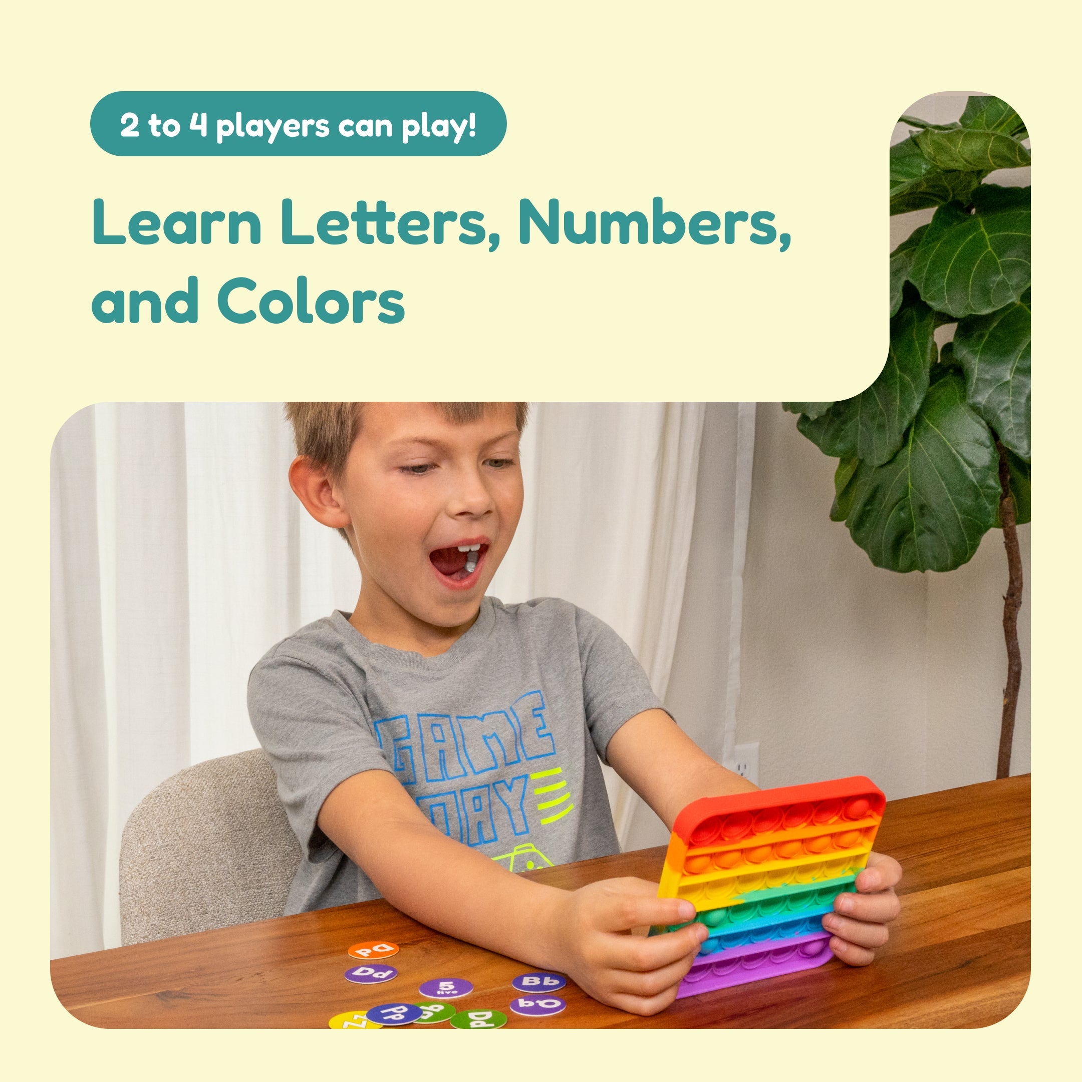 Child playing with a colorful educational toy at a table.