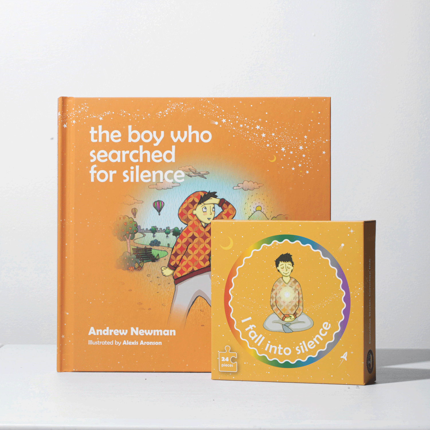 Two books titled 'the boy who searched for silence' and 'I fall into silence' by Andrew Newman on a white background.