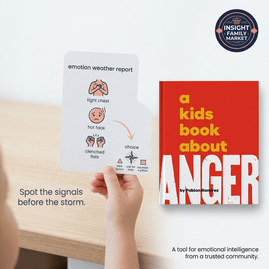 Child holding emotion chart near book titled 'A Kids Book About Anger' on a desk.