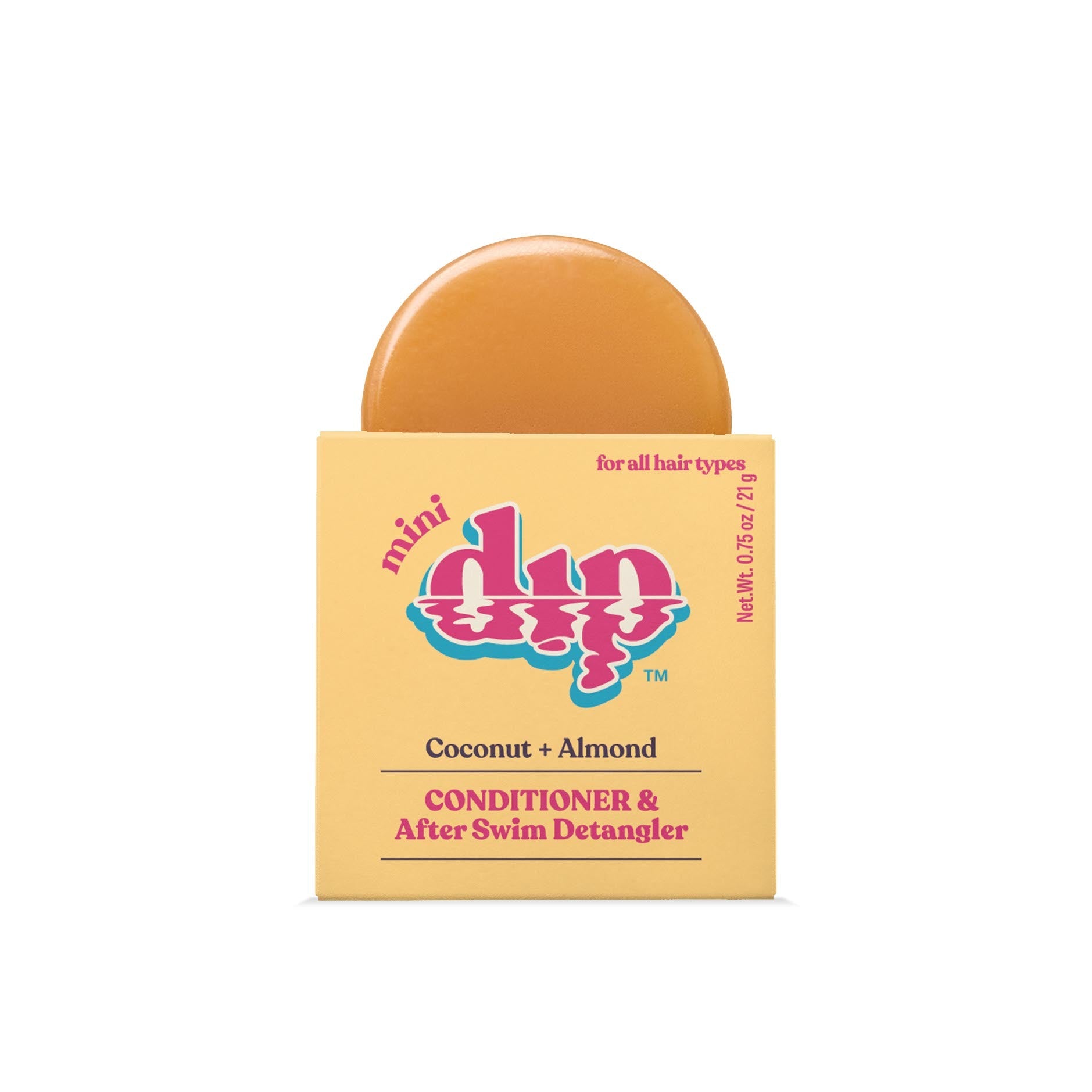 Bar of soap with packaging labeled 'mini dip' on a white background