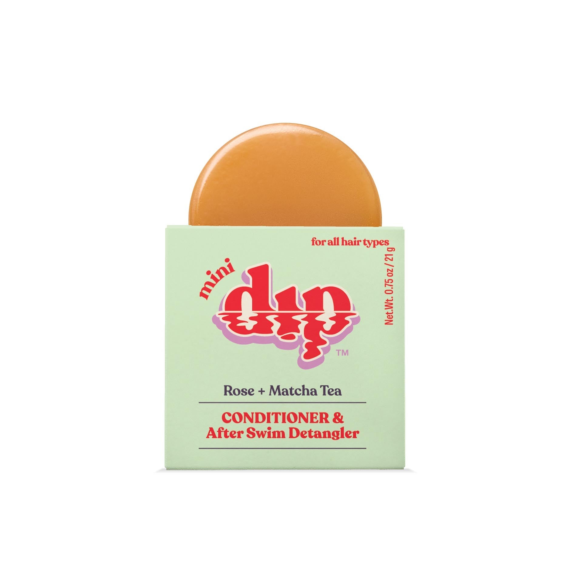 Bar of soap with packaging labeled 'mini dip' on a white background