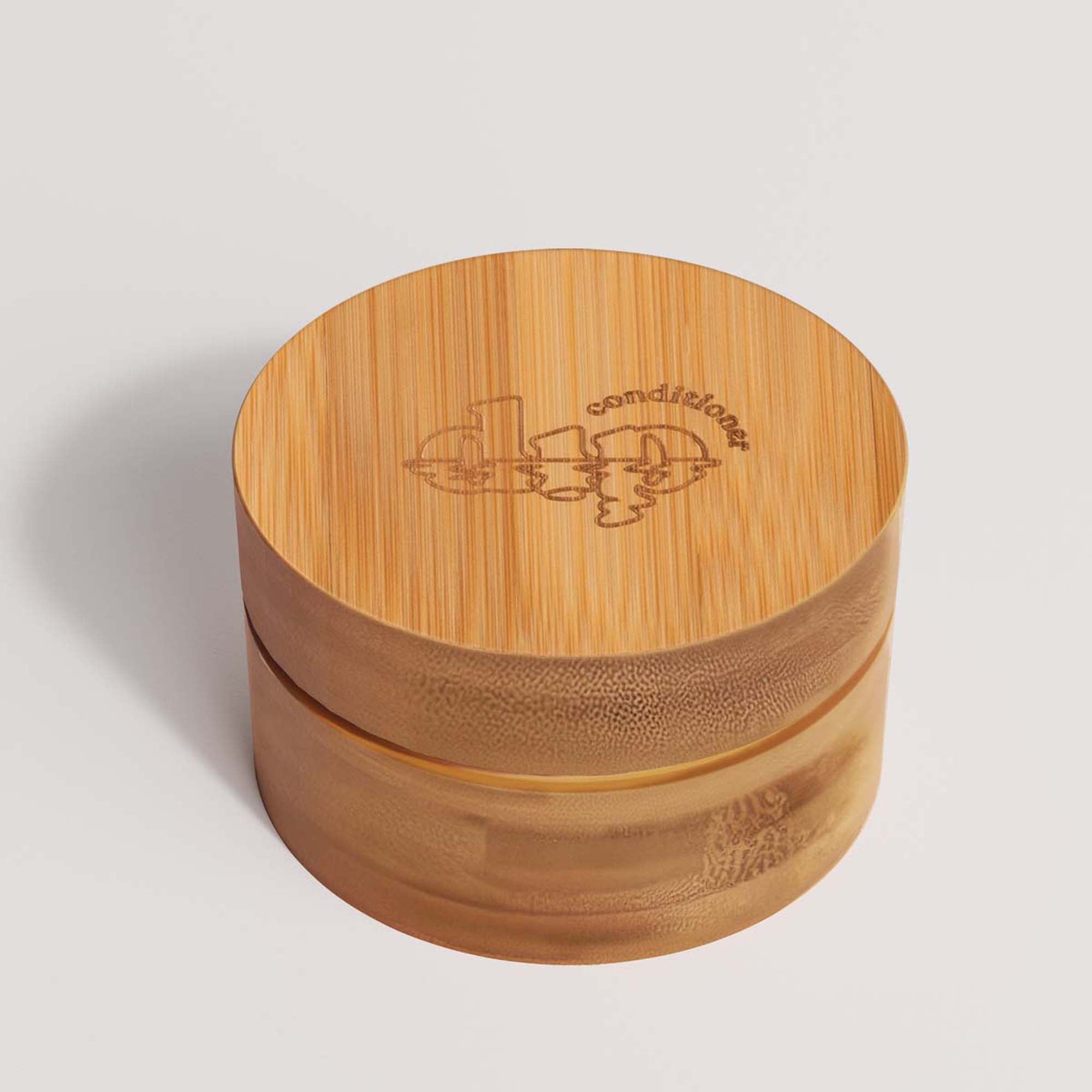 Bamboo container with lid on a light gray background