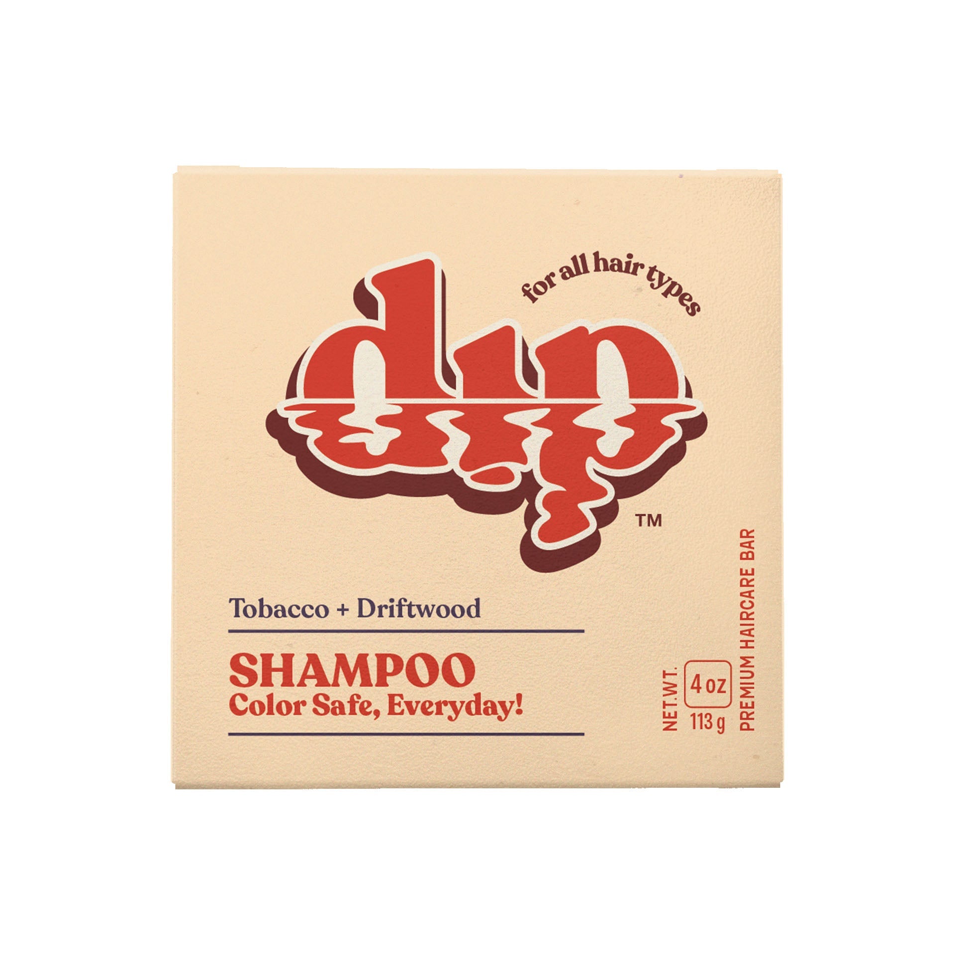 Box of shampoo with red and brown text on a beige background