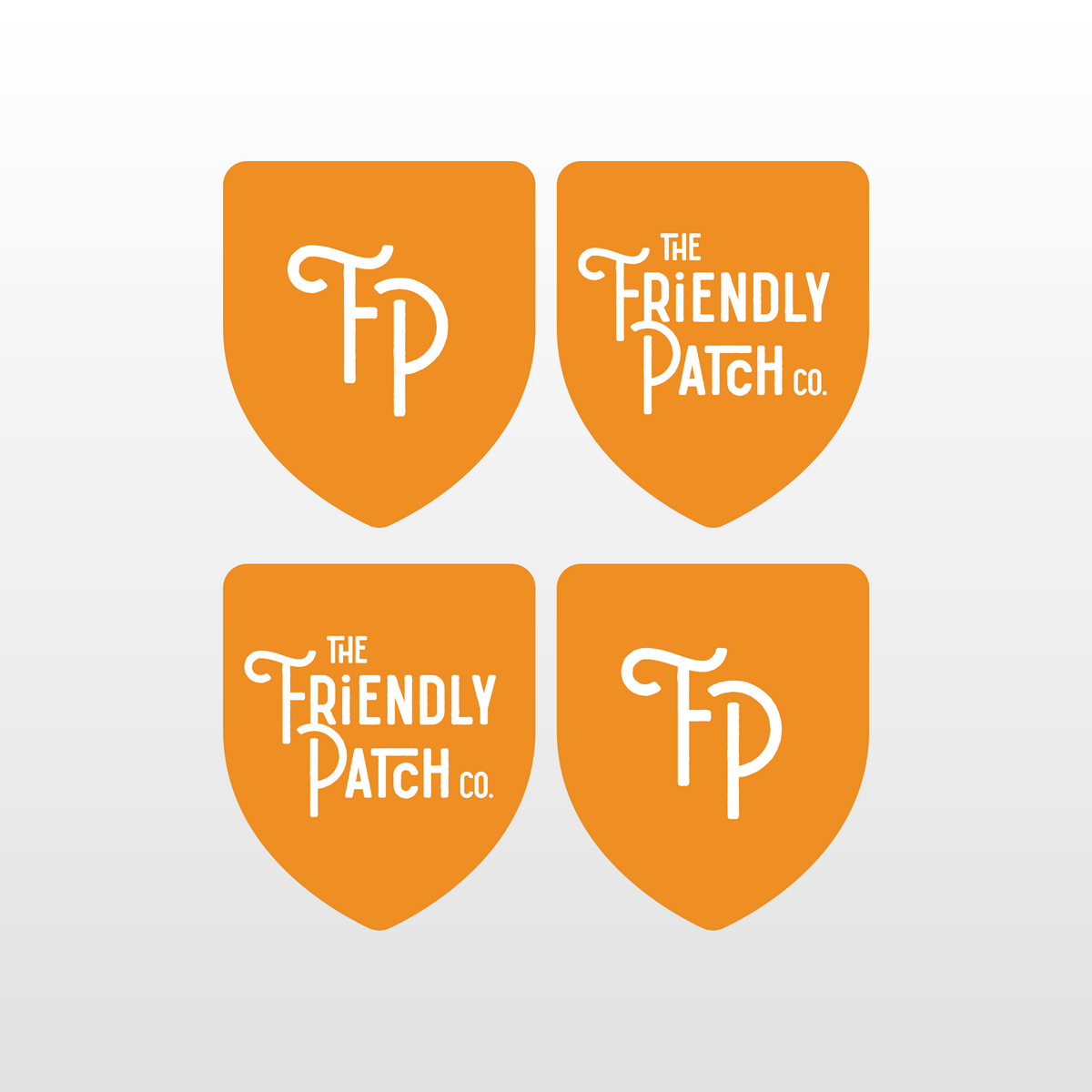 Four orange patches with 'The Friendly Patch Co.' logo on a white background