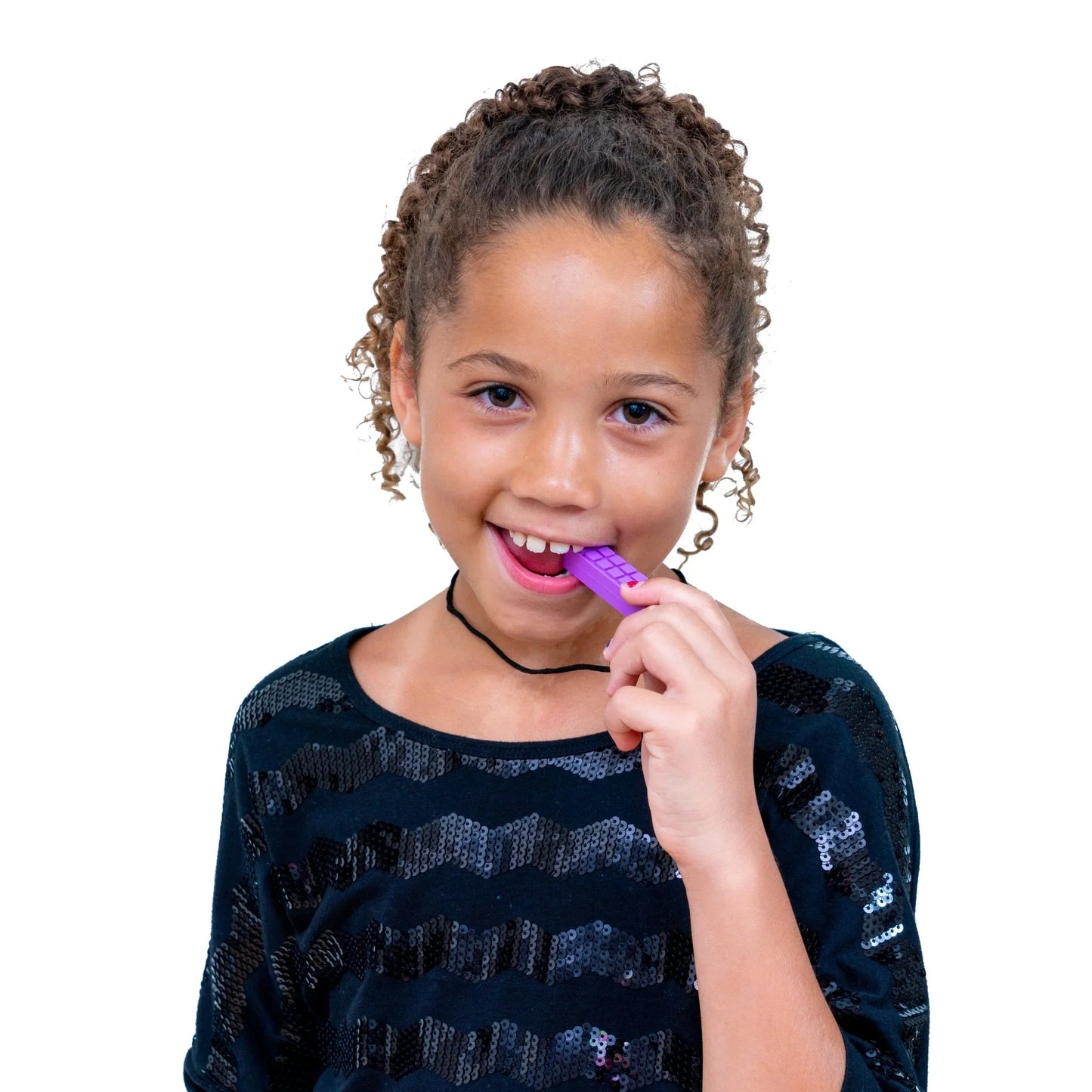 Child using purple sensory chew necklace, sensory tool for focus and self-regulation