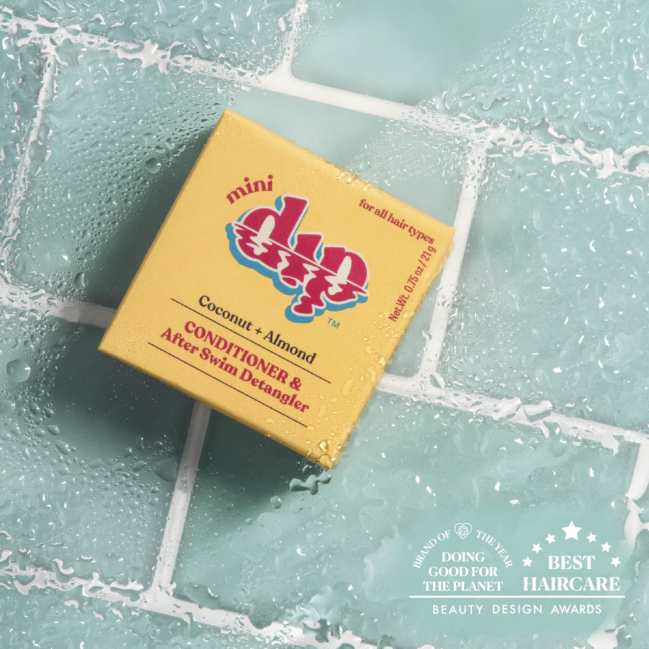Yellow box of Doo Gro hair care product on a textured blue background