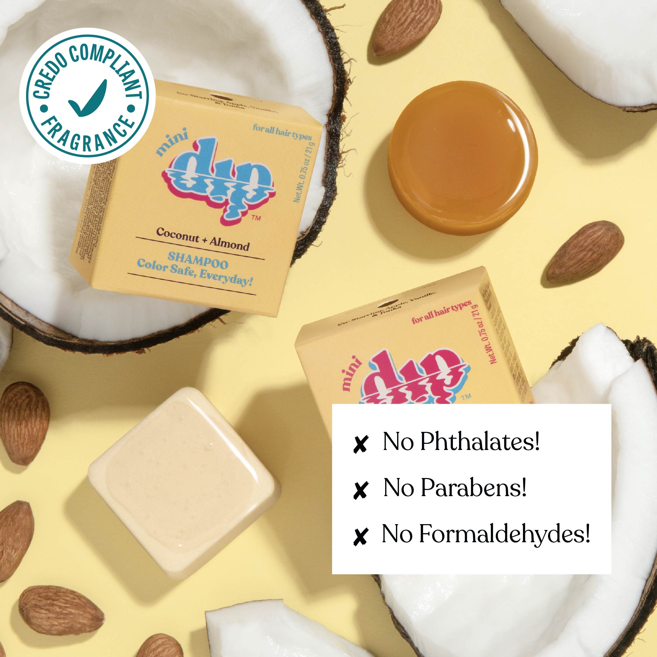 Duo shampoo bars with coconut and almond ingredients on a yellow background