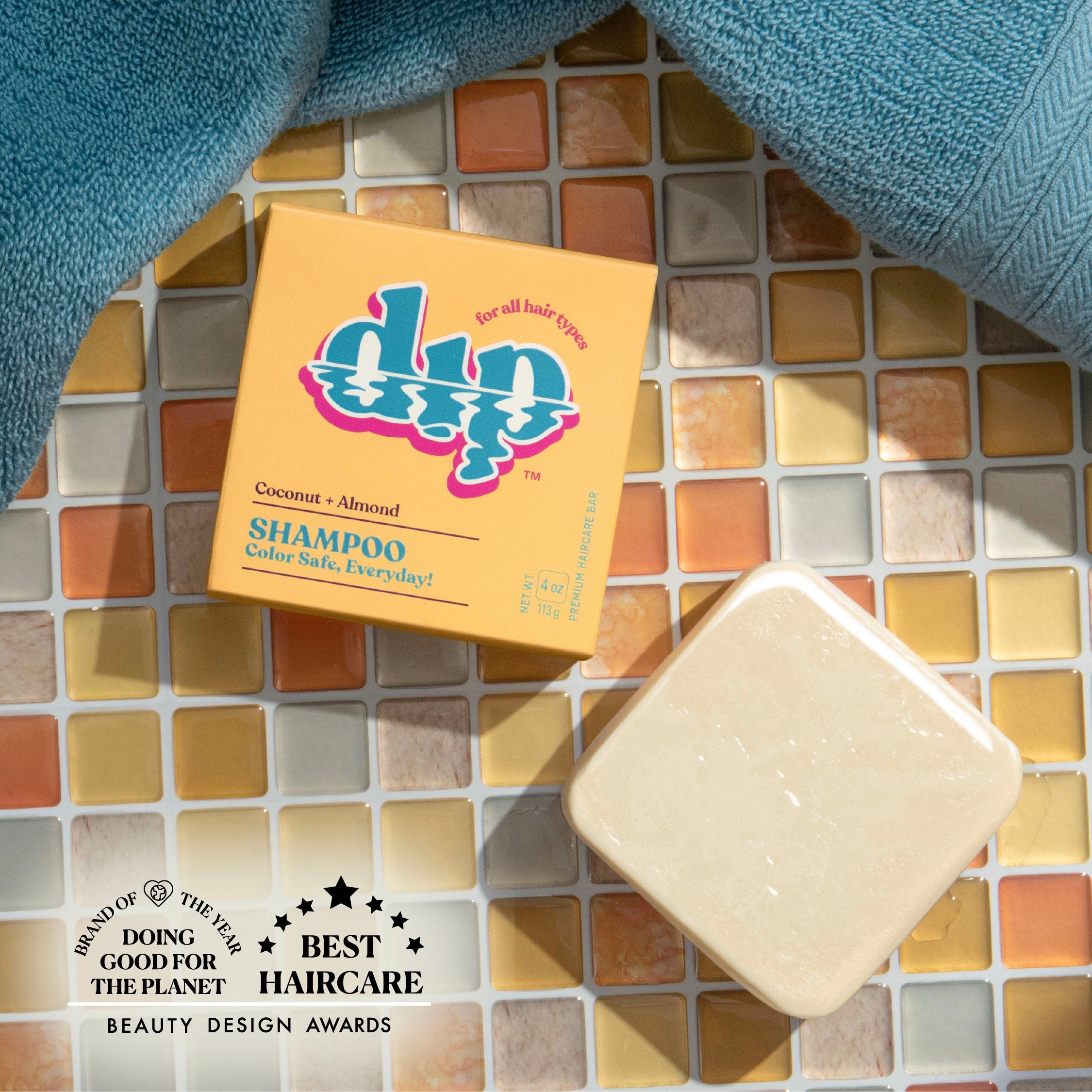 Dap shampoo box with a bar of soap on a tiled surface