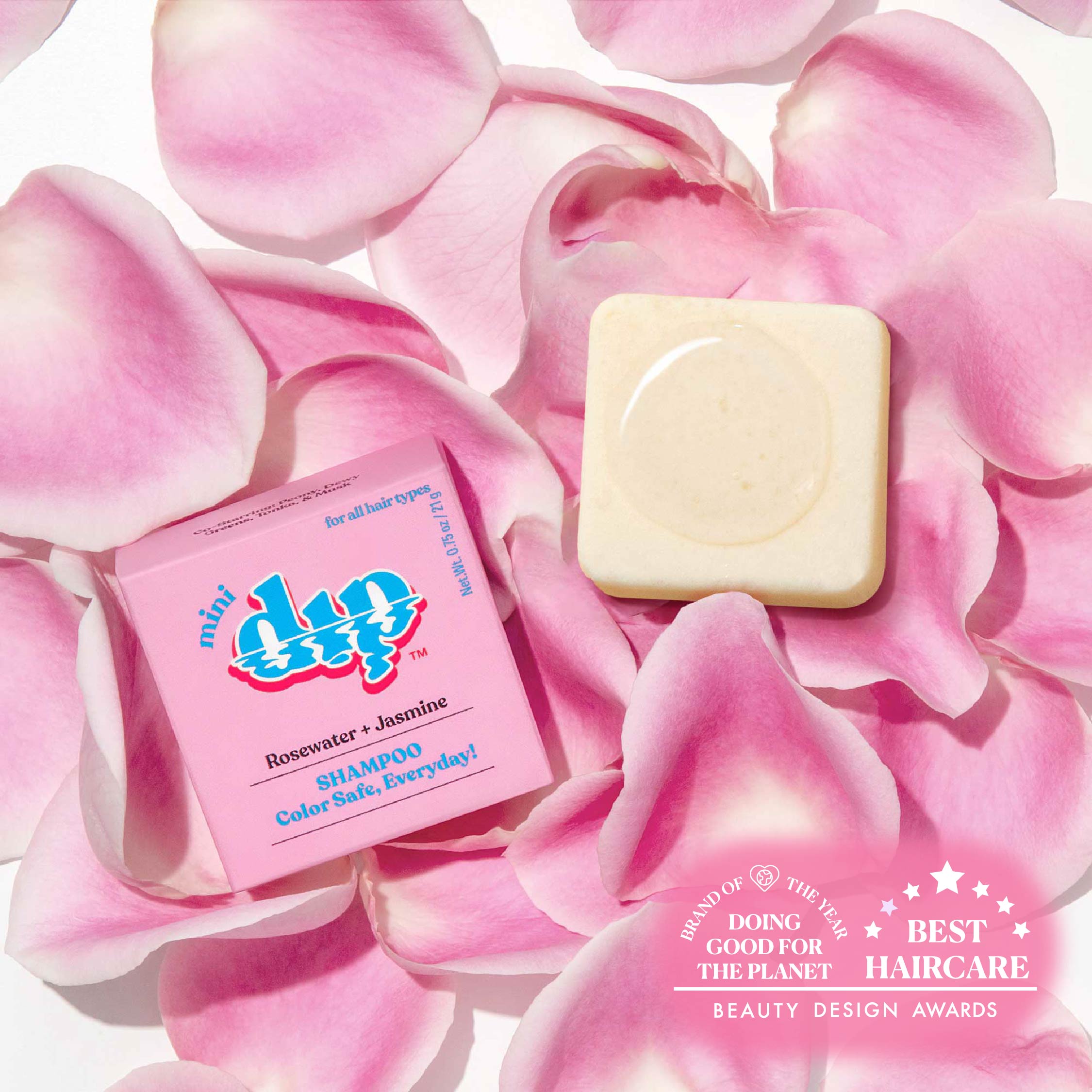 miu dip shampoo bar and soap on pink rose petals with awards text