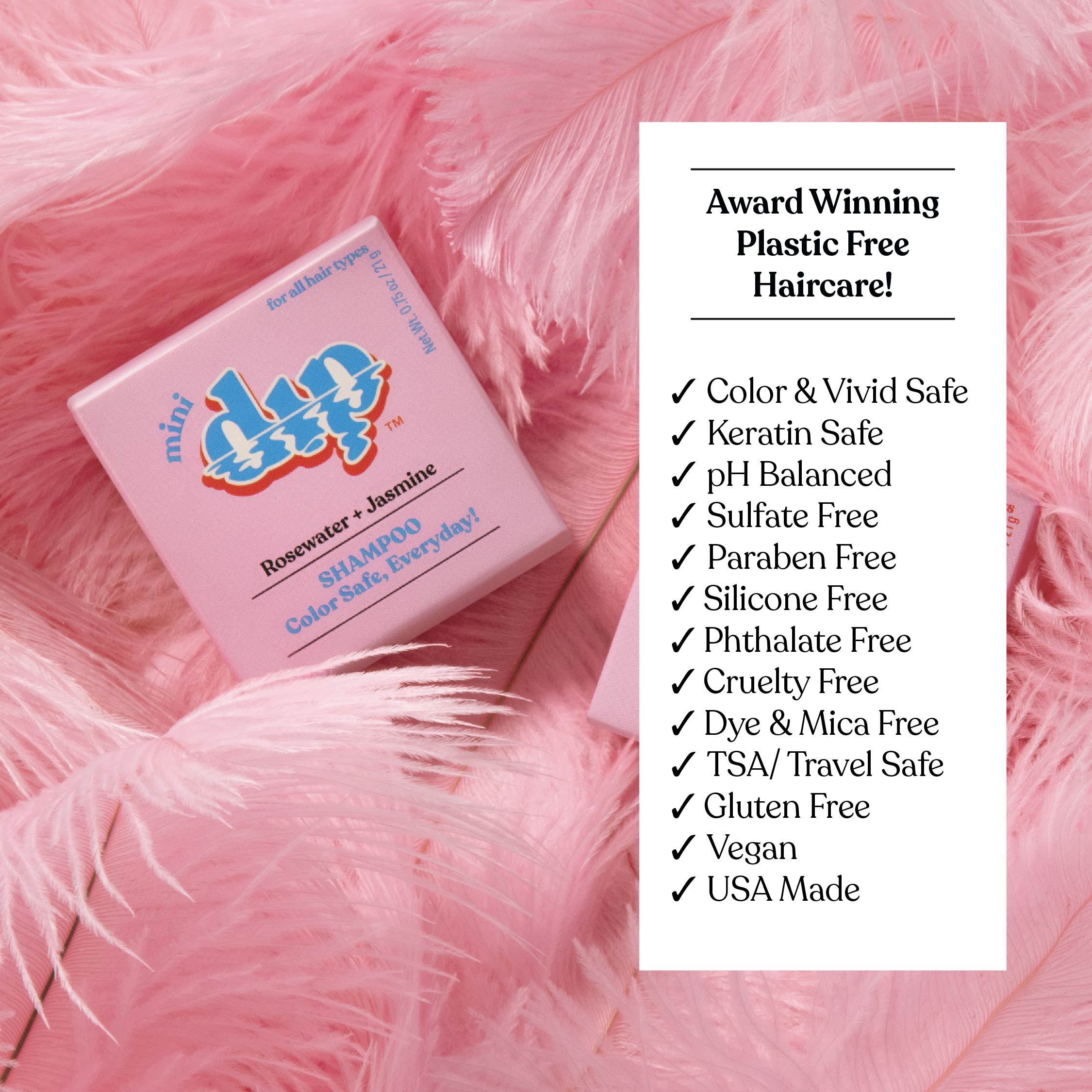 Pink hair care product box on pink feathers with text highlighting features