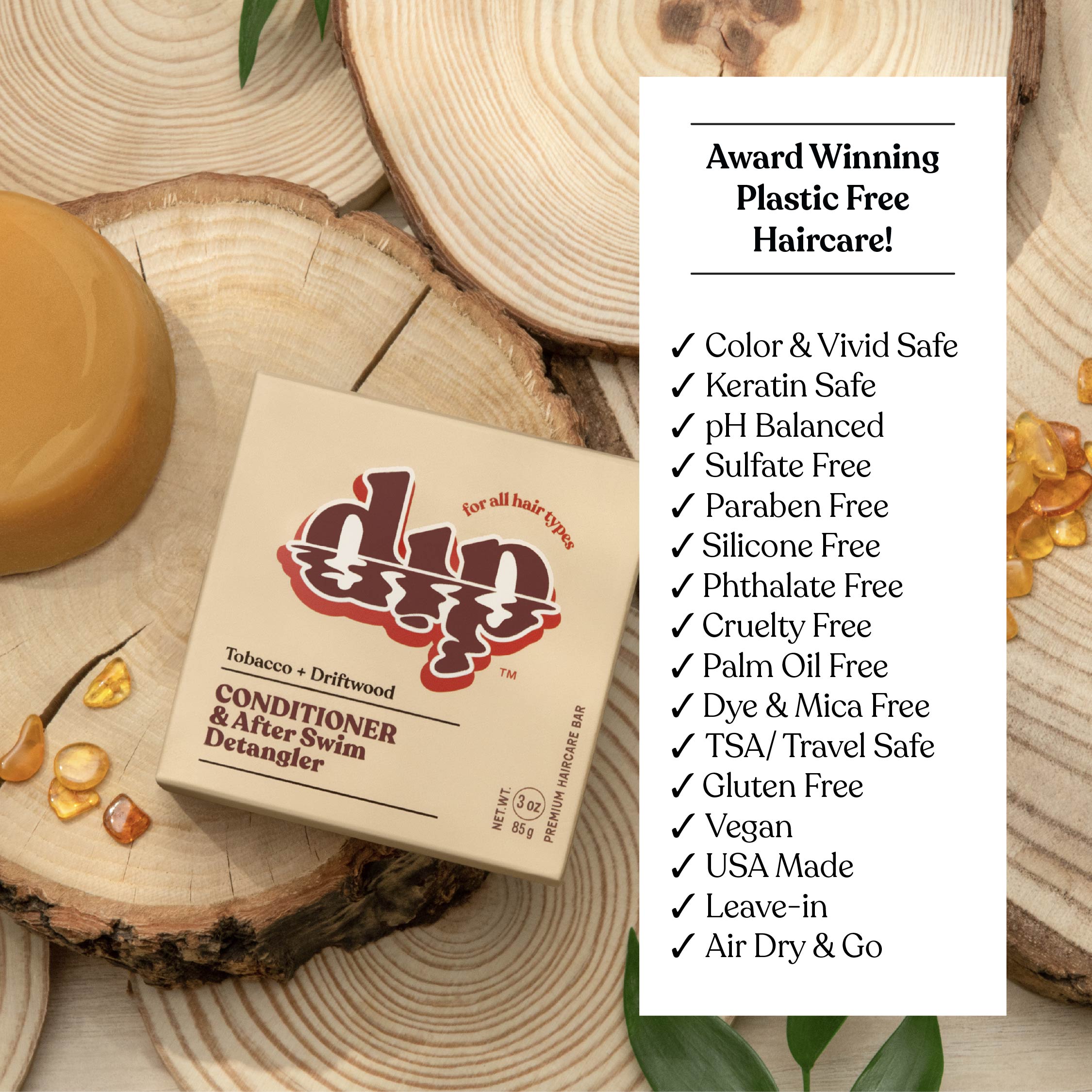 Box of 'din dip' hair care product on wooden surface with text highlighting features.