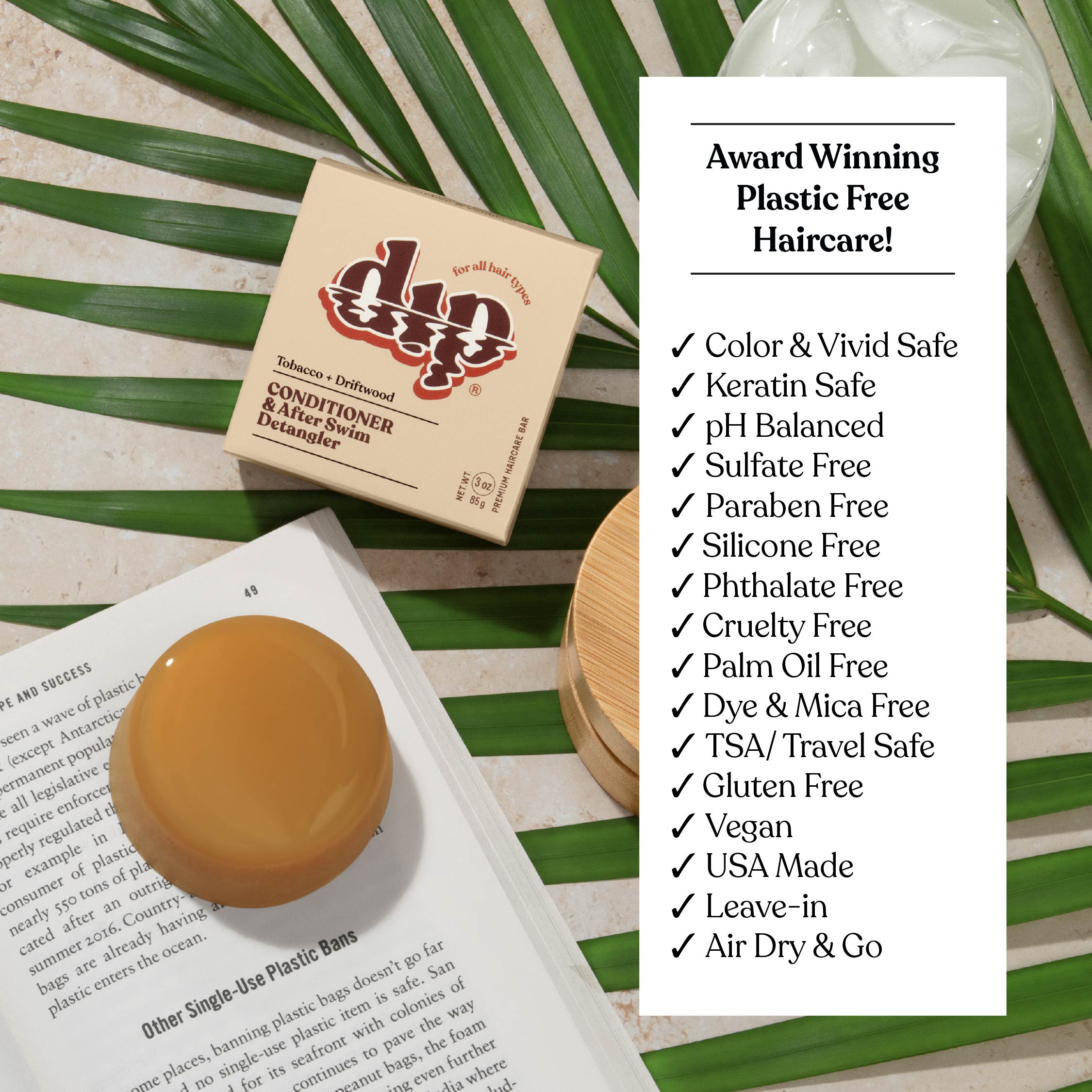 Product packaging with a list of features on a green leaf background