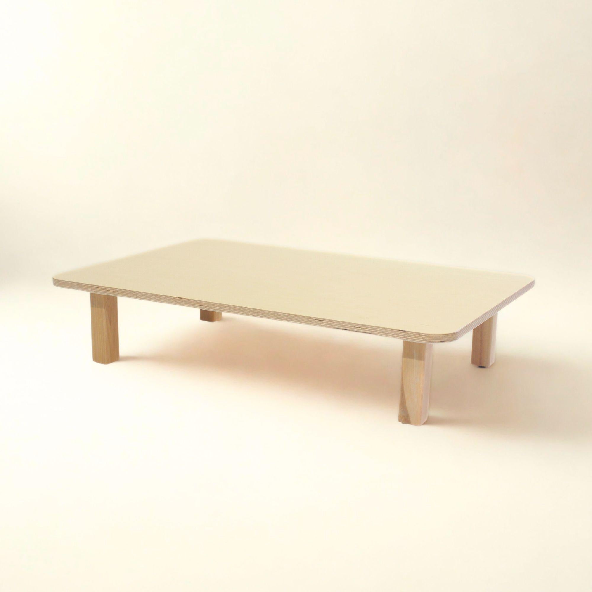 Beige coffee table on a white background