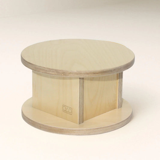 Wooden toddler stool with round top, sensory-friendly, smooth light wood finish