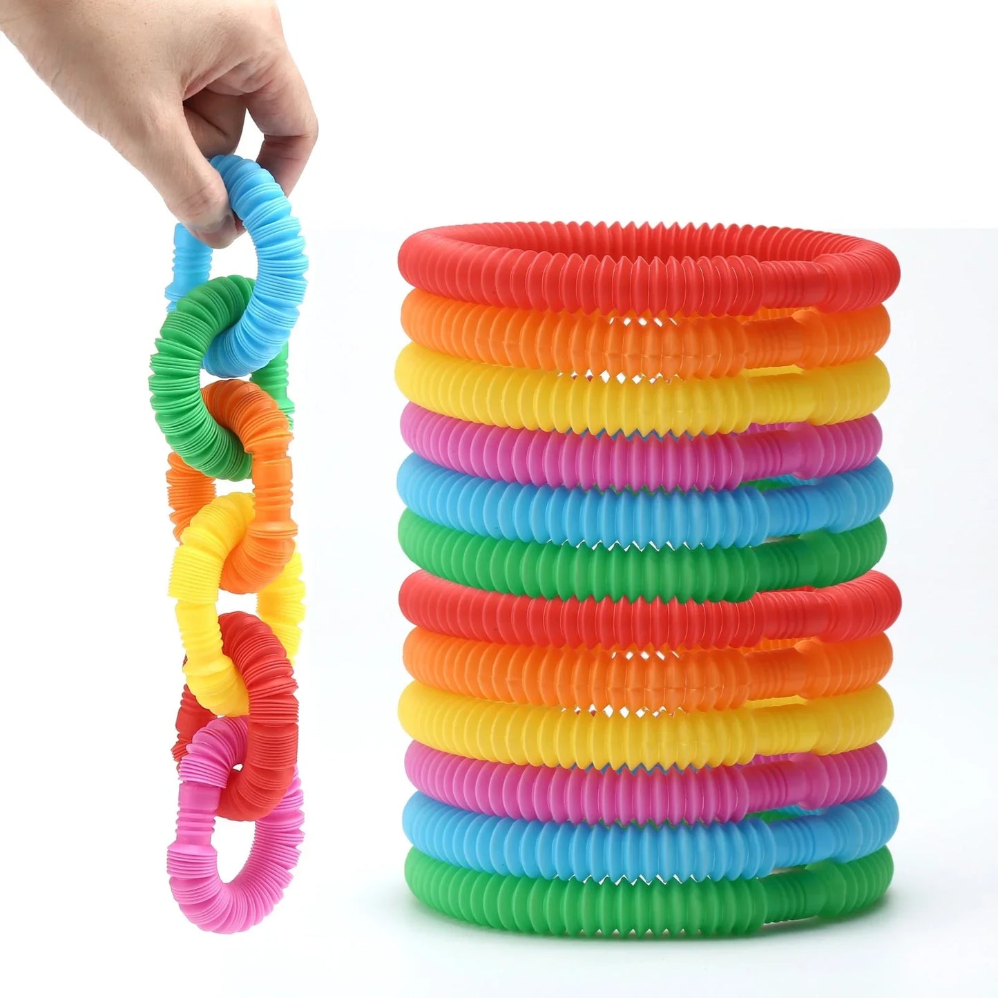 Stack of colorful sensory fidget tubes with hand holding linked rings, autism ADHD toy
