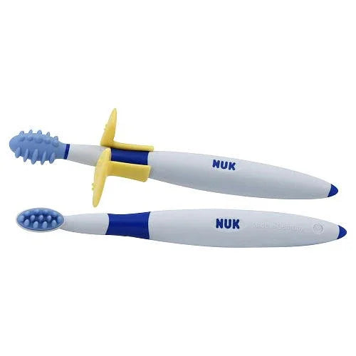 Two child-friendly toothbrushes with blue bristles and ergonomic handles, sensory oral care.
