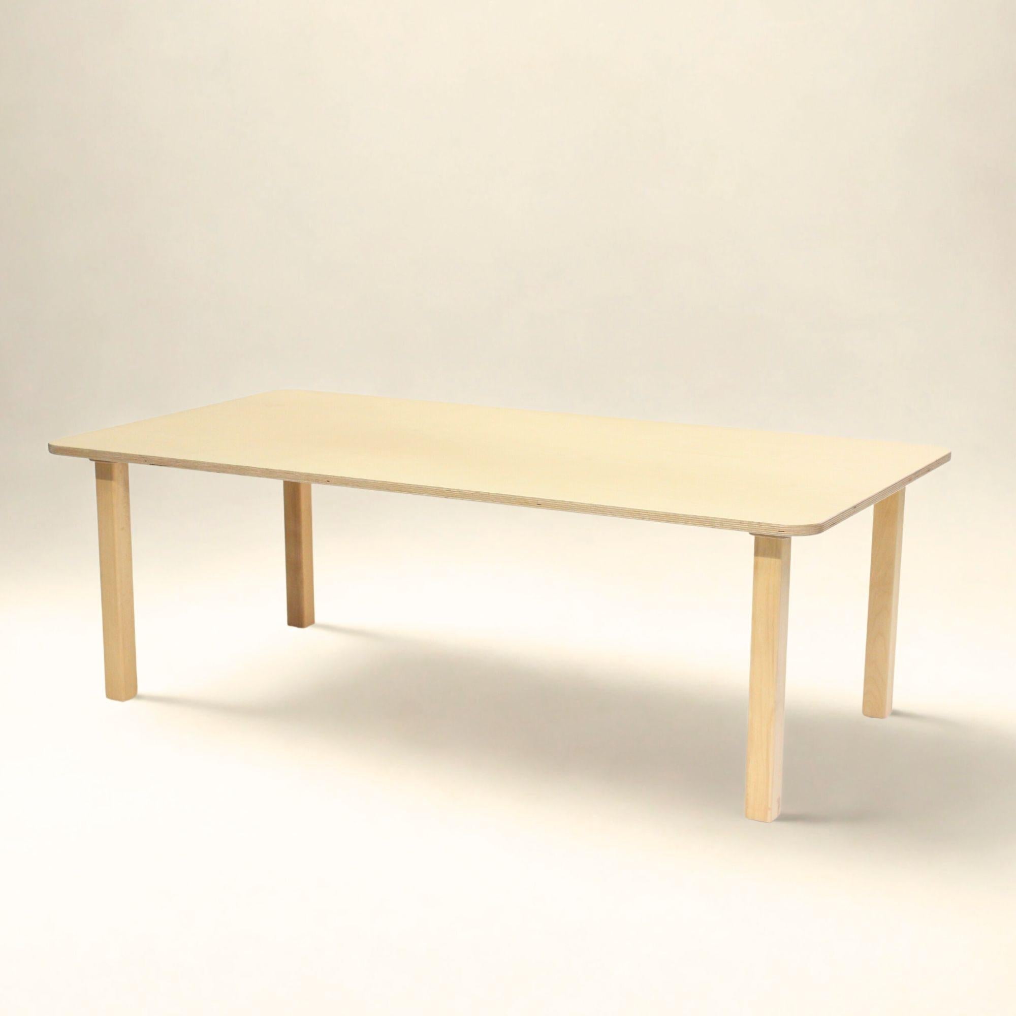 Wooden table on a plain background