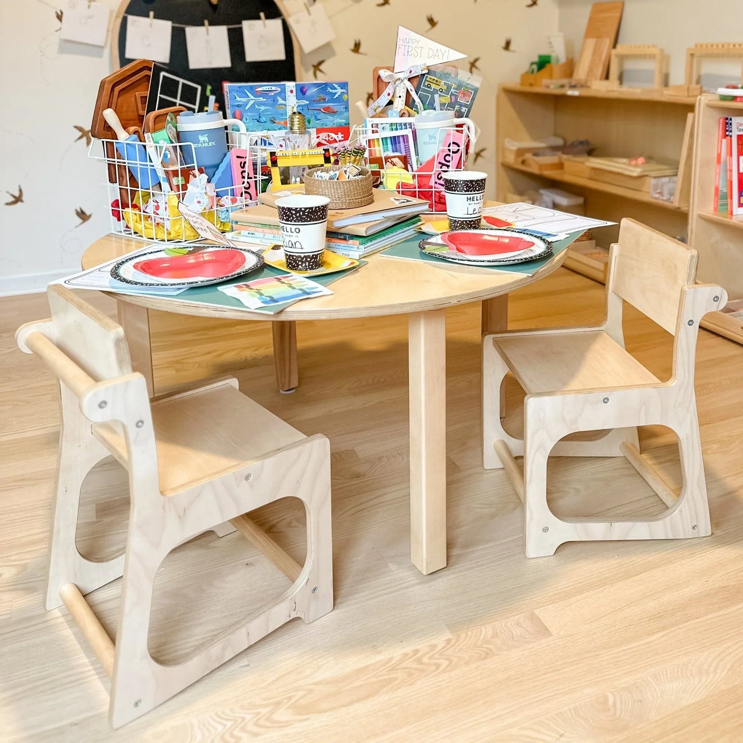 Sensory-friendly kids’ wooden chairs and round table set with crafts and learning tools