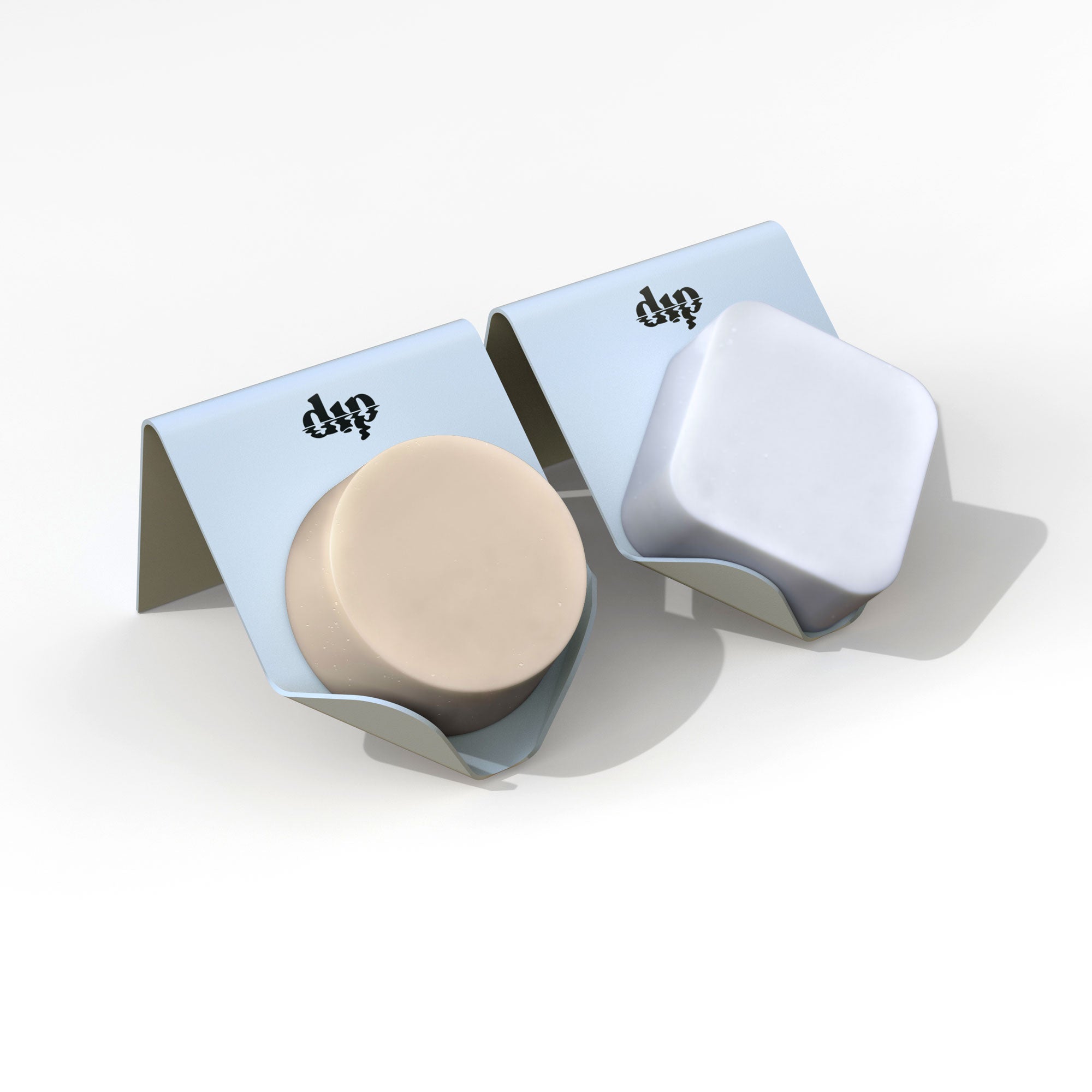 Two small containers with a beige lid and blue bases on a white background