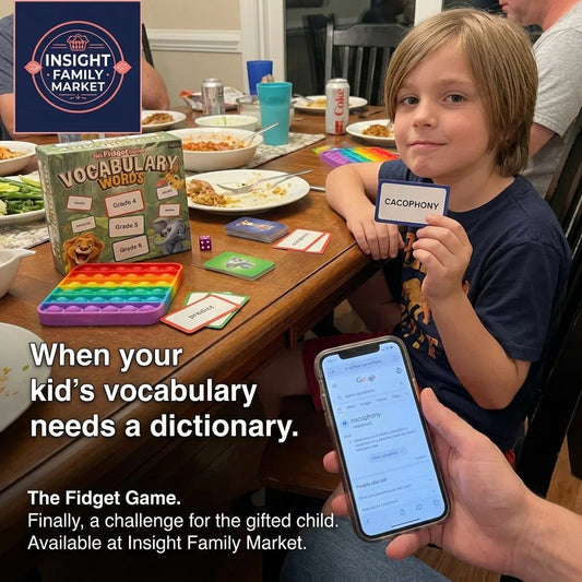Gifted child holding vocabulary card for 'cacophony' at dinner table with educational game, sensory fidget toy, and phone showing word definition.