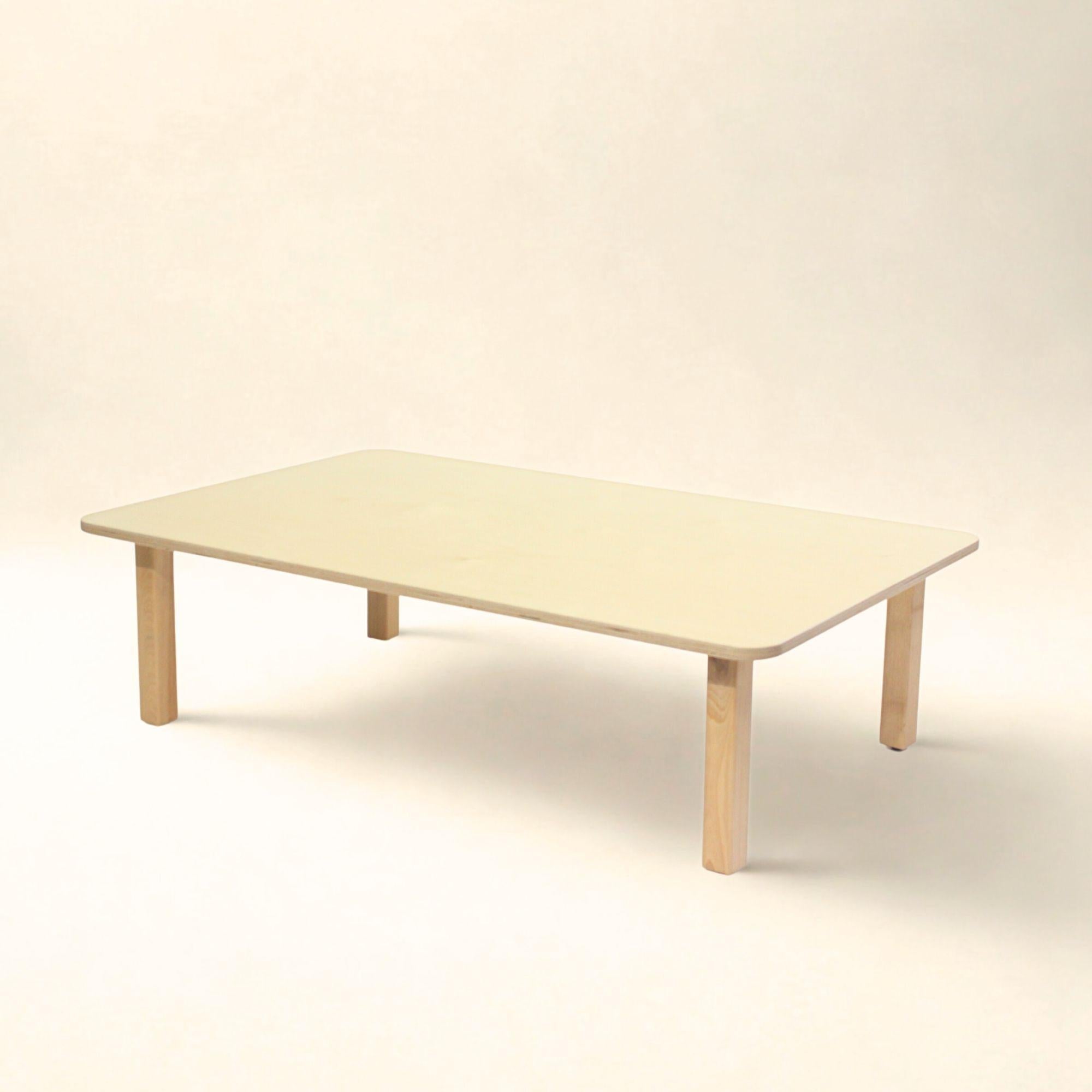 Light wood coffee table on a beige background