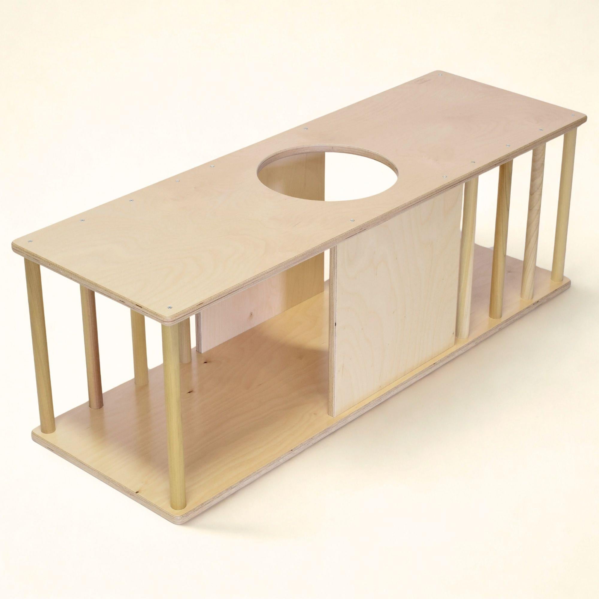 Wooden shelf with a round hole on a white background