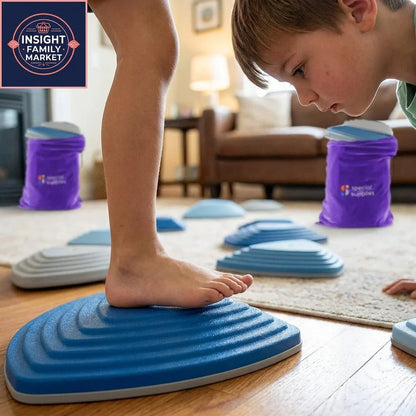 Child playing indoors with sensory balance stepping stones on a wood floor.