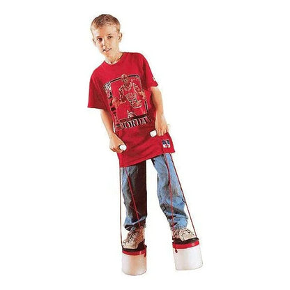 Child in a red t-shirt using sensory balance stilts for motor skills and balance development