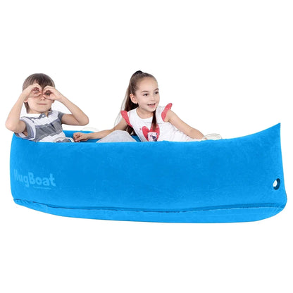 Two children playing in a blue sensory inflatable HugBoat for kids