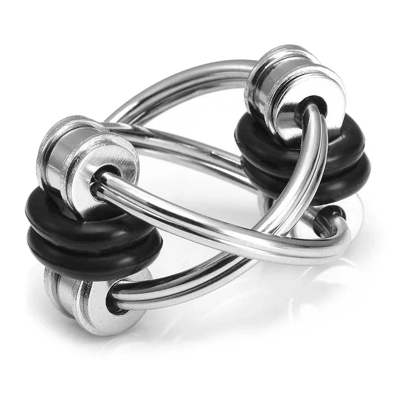 Metal fidget toy with black rubber rings, sensory tool for focus and stress relief