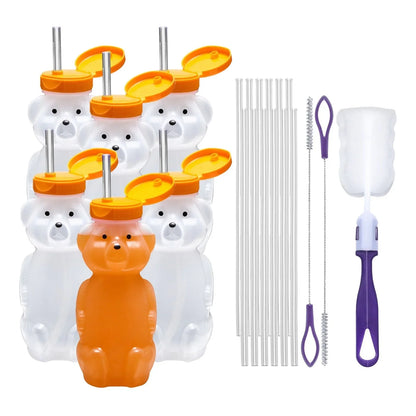 Set of bear-shaped sensory drink bottles with yellow lids, straws, and cleaning brushes.