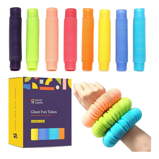 Colorful Giant Fun Tubes with packaging and a hand holding some tubes.