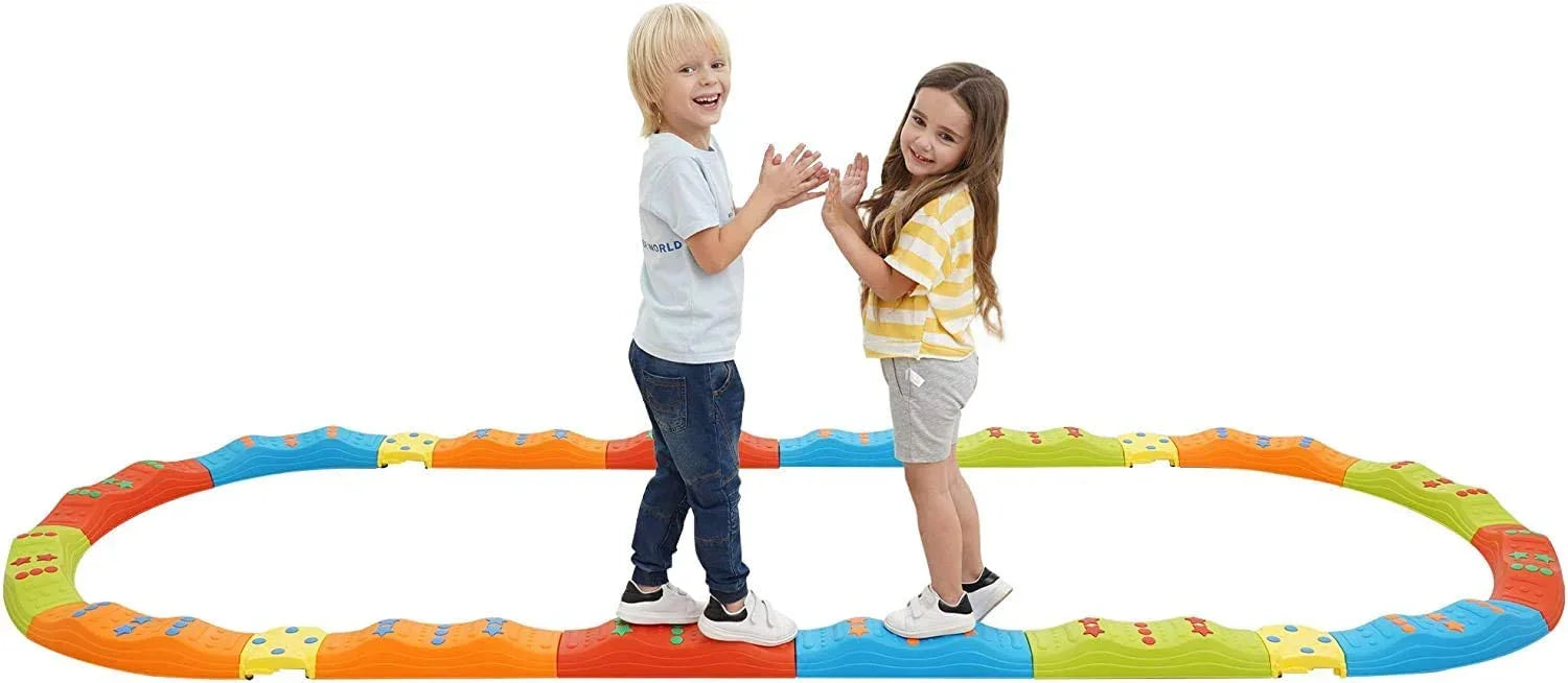 Two children playing on a colorful sensory balance beam obstacle course