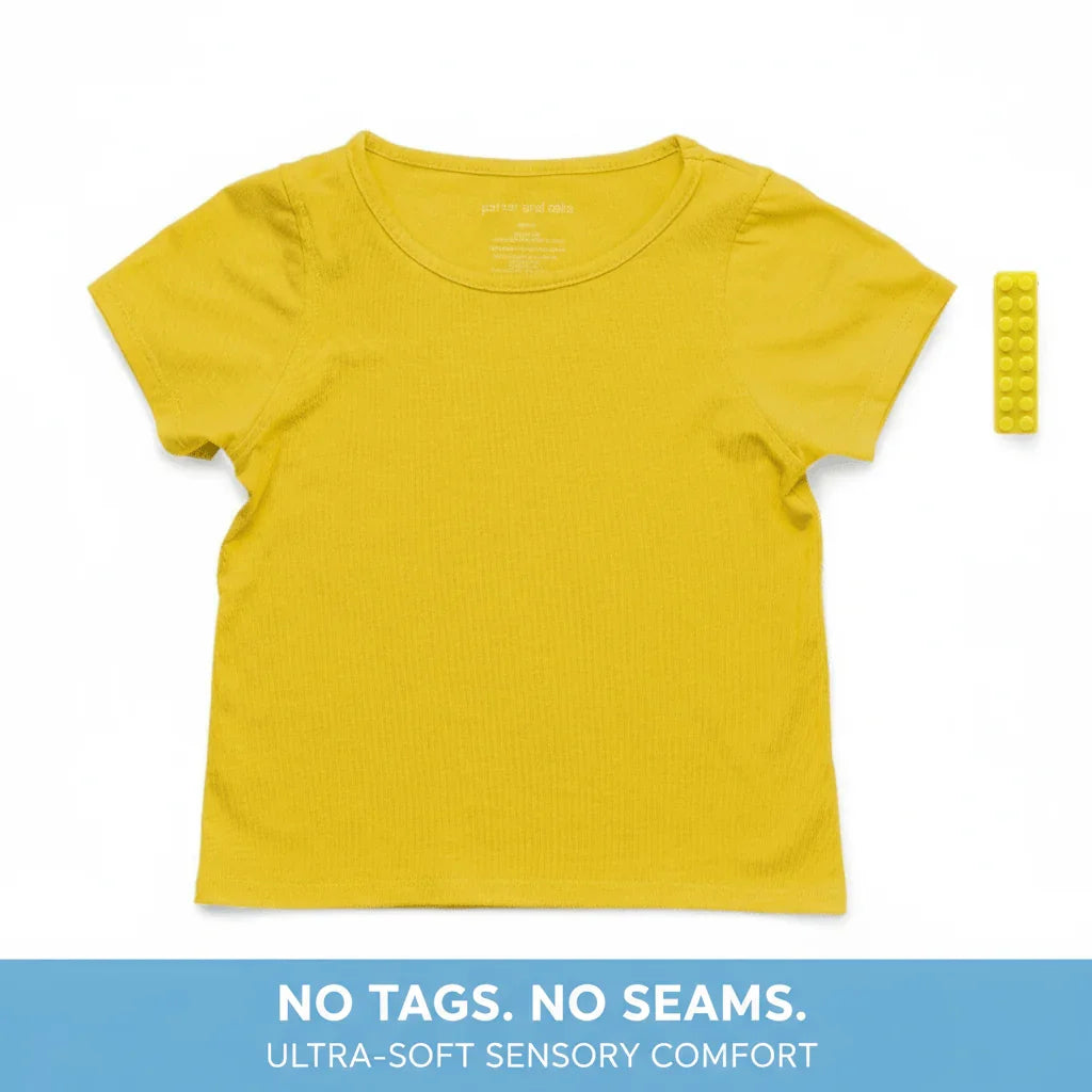 Yellow sensory-friendly seamless short sleeve shirt for kids on white background.