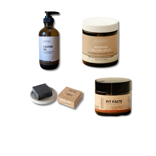 Collection of skincare products including a bottle, jars, and a bar on a white background
