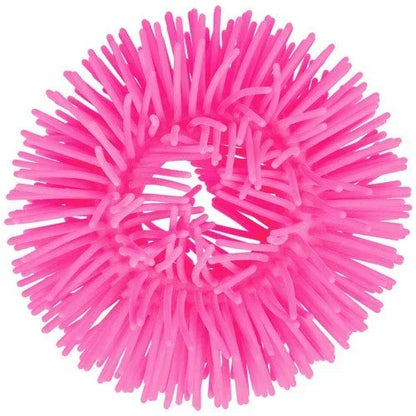 Pink sensory bracelet with soft textured spikes, ideal for fidgeting and sensory support.