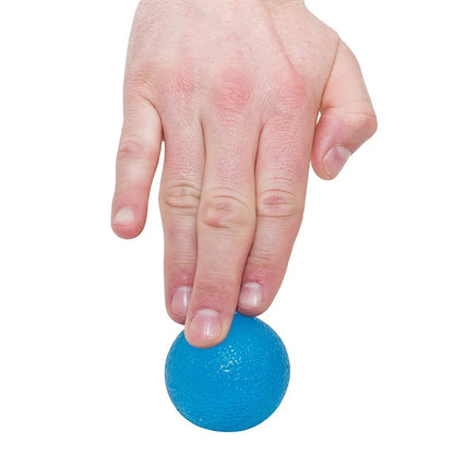 Hand pressing blue textured sensory stress ball for fidgeting and fine motor skills