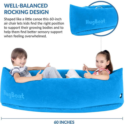 Two kids sitting in a blue sensory HugBoat air chair, 60-inch canoe-shaped for sensory support.