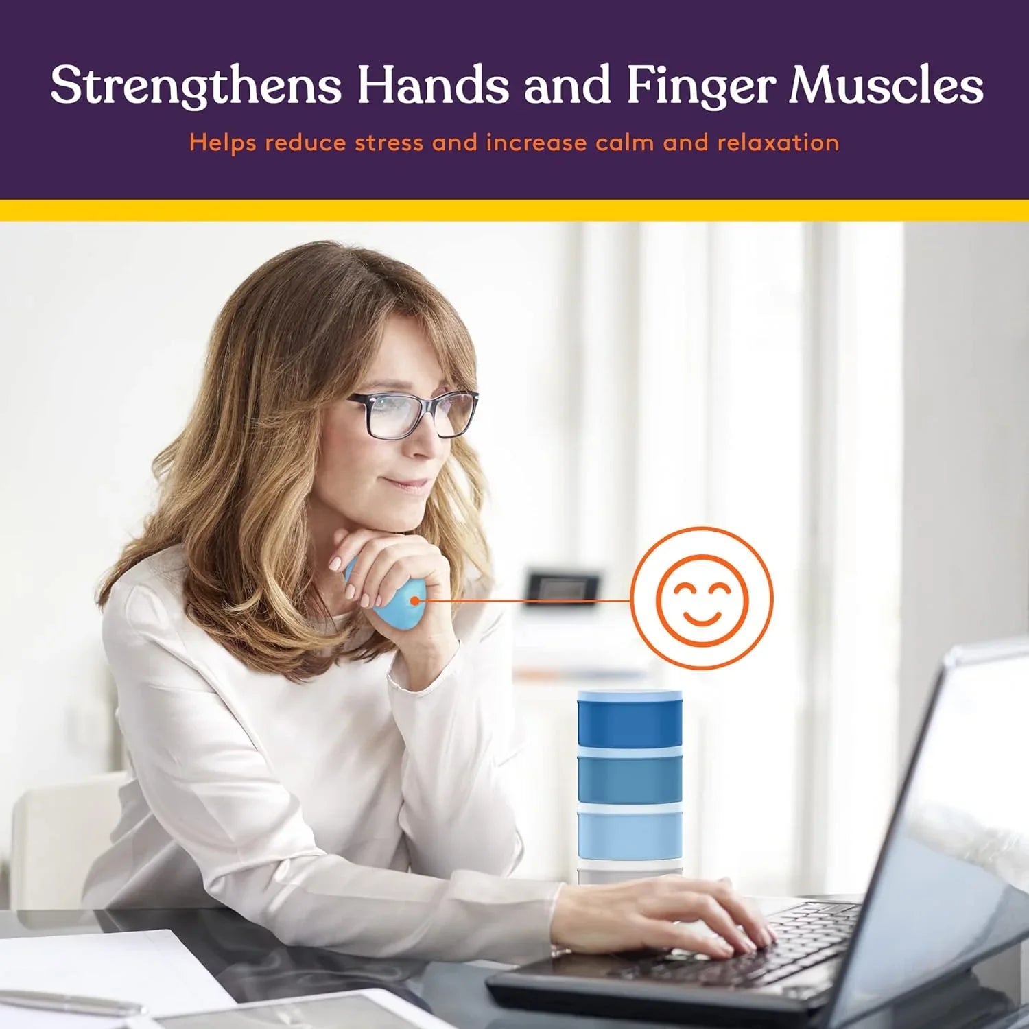 Woman using blue hand therapy stress ball at desk for finger and hand muscle exercise