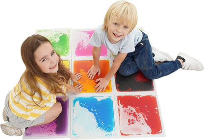 Two children playing on colorful sensory floor tiles, sensory-friendly play activity
