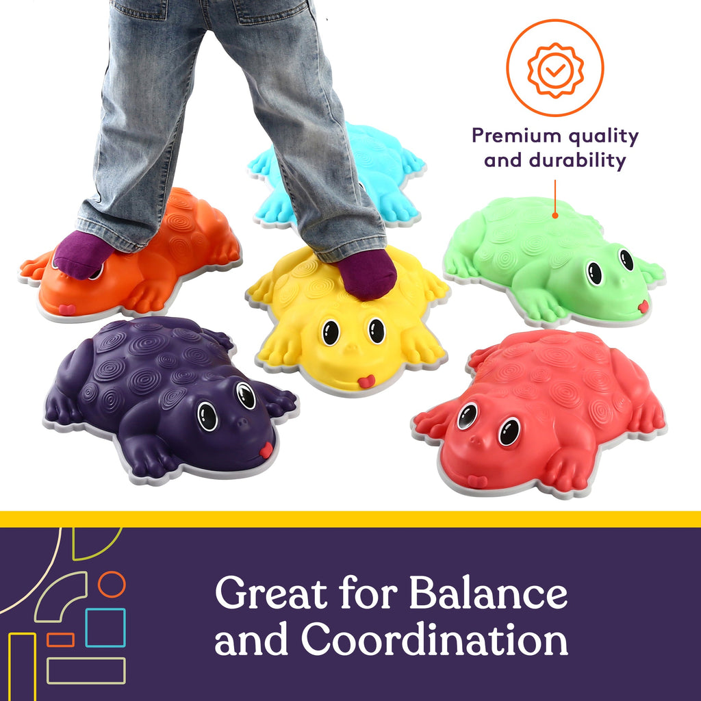 Colorful frog-shaped balance boards with a child's feet on them, on a white background.