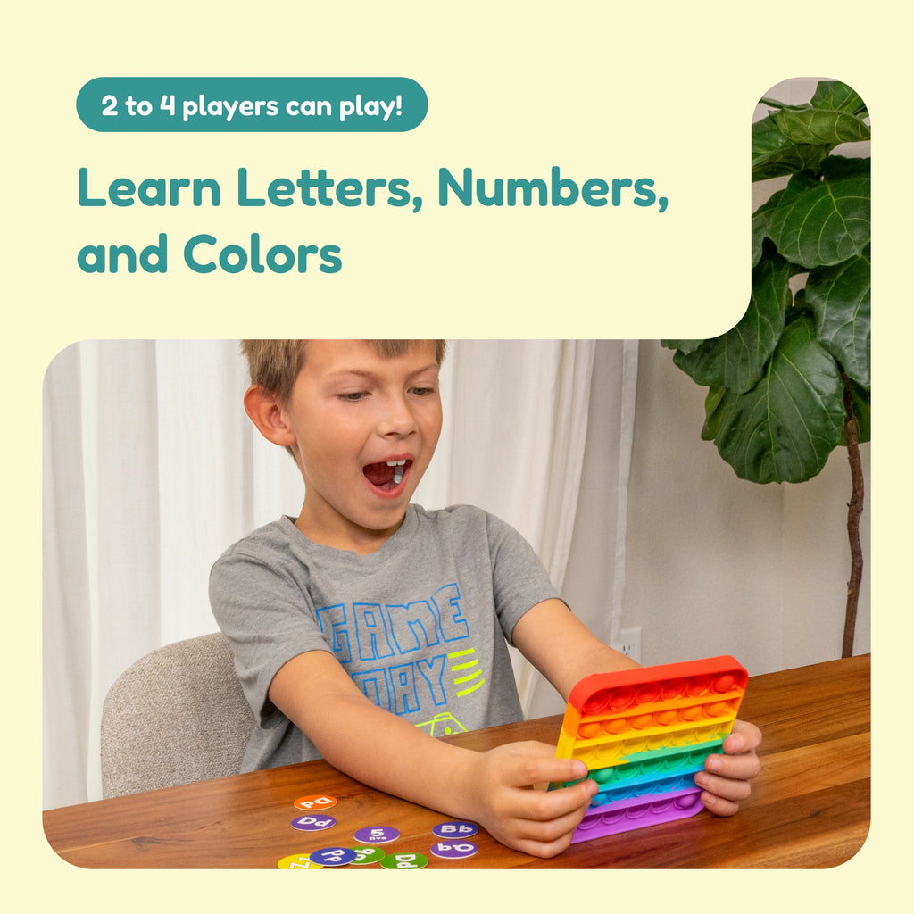 Child playing with a colorful educational toy at a table.