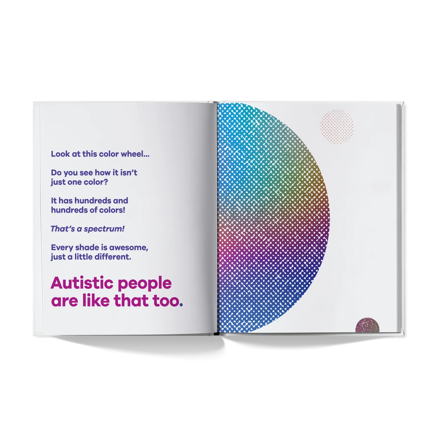 Open book showing text about autism as a spectrum, with a colorful dotted spectrum circle.