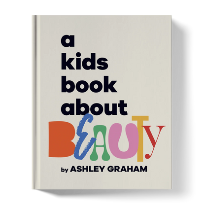 A children’s book titled 'a kids book about BEAUTY' with colorful, bold lettering on the cover.