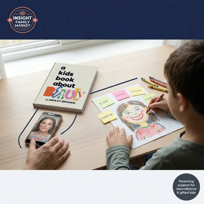 Child drawing a smiling face with positive note cards, book about beauty, and phone video call, supporting neurodiverse and gifted kids.