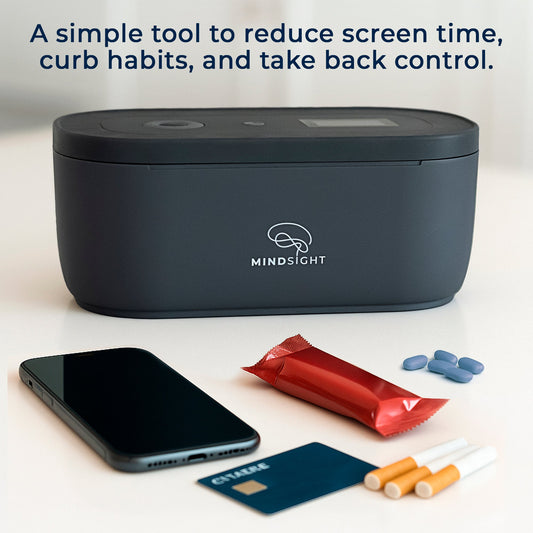 Mindsight device with smartphone, snacks, and a card on a light background