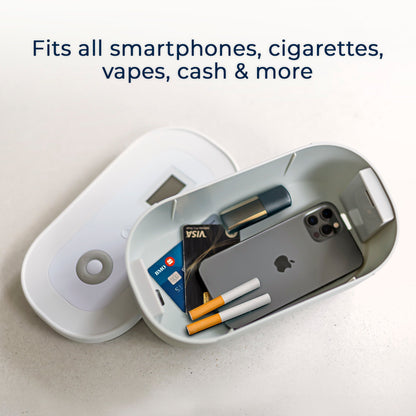 Multifunctional case with smartphone, cards, and cigarettes on a light background